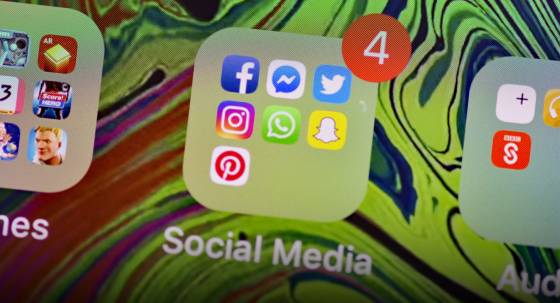 A phone showing social media applications (Image: AAP/Nick Ansell/PA Wire)