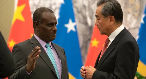 Then Solomon Islands foreign minister, now Prime Minister Jeremiah Manele and Chinese Foreign Minister Wang Yi in 2019 (Image: AP/Mark Schiefelbein)