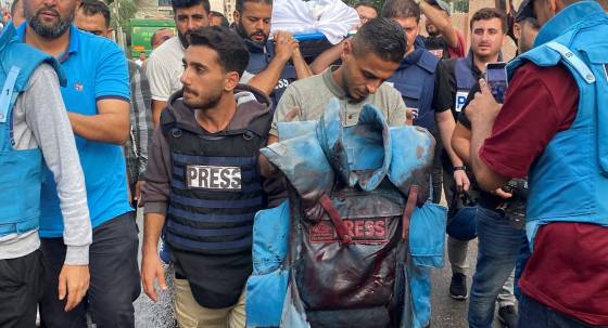 A blood-stained flak jacket belonging to a Palestinian journalist