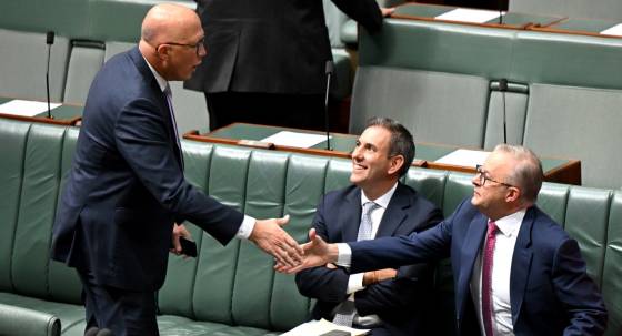 Anthony Albanese and Peter Dutton shake hands (Image: AAP/Lukas Coch)