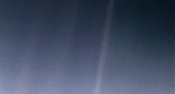 'Pale Blue Dot', a photograph taken from about 6 billion kilometers away by the Voyage 1 space probe, showing Earth as a tiny dot within deep space (Voyager 1/NASA)