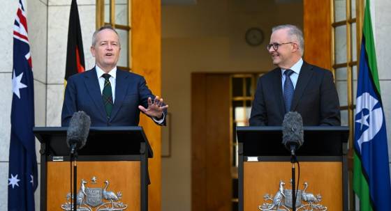 Bill Shorten announces his retirement from politics next to Anthony Albanese (Image: AAP/Lukas Coch)