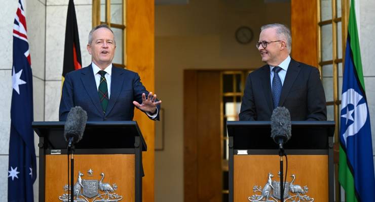 Bill Shorten announces his retirement from politics next to Anthony Albanese (Image: AAP/Lukas Coch)